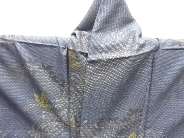  未使用品　仕立て上がり　蝶に草花模様織り出し本場泥大島紬着物(7マルキ)